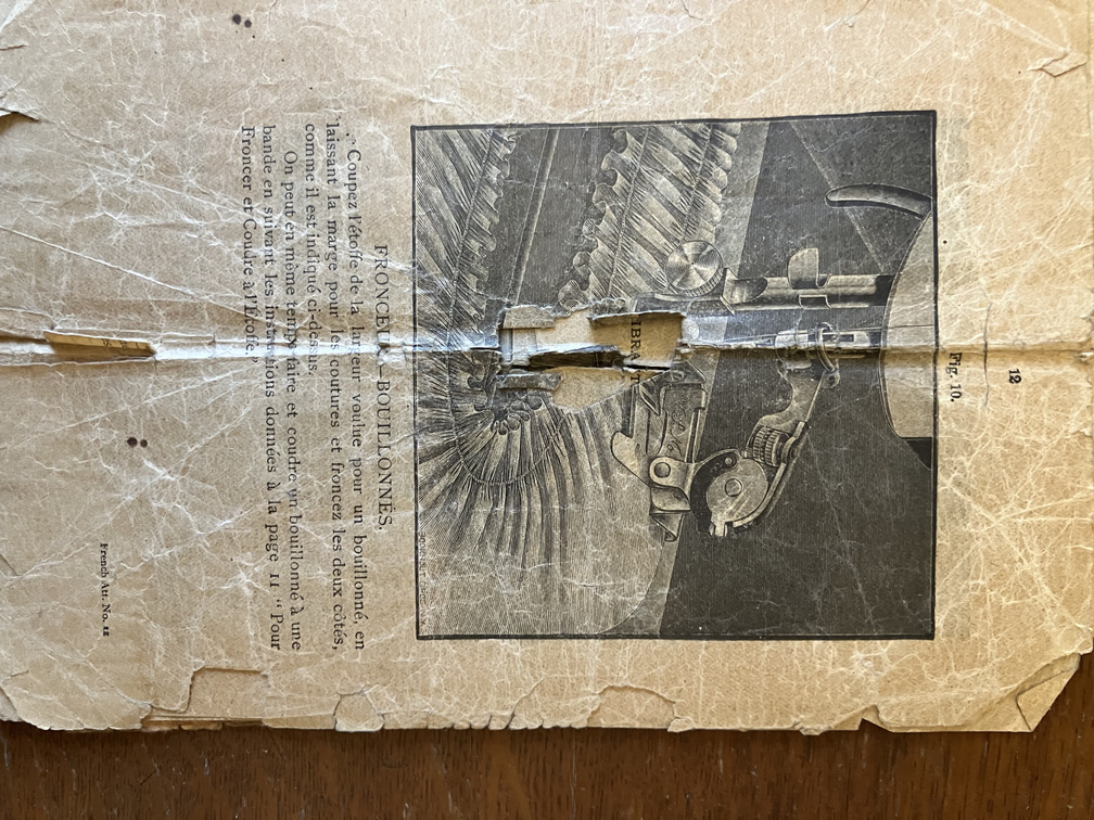Instructions illustrated with needle and feed detail
